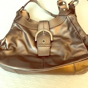 Coach authentic bronze all leather shoulder bag.